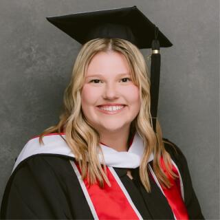 Julie Schnell, graduation headshot