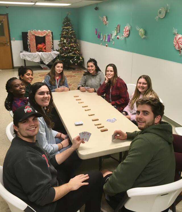 Buck-I-SERV students playing cards at Solomon's Temple