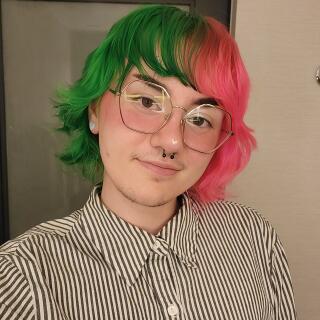 Code smiling at camera.