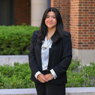 Jocelyn smiling at camera.