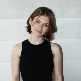 Olivia smiling at the camera.