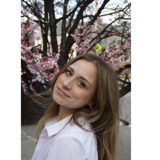 Claire smiling at camera.