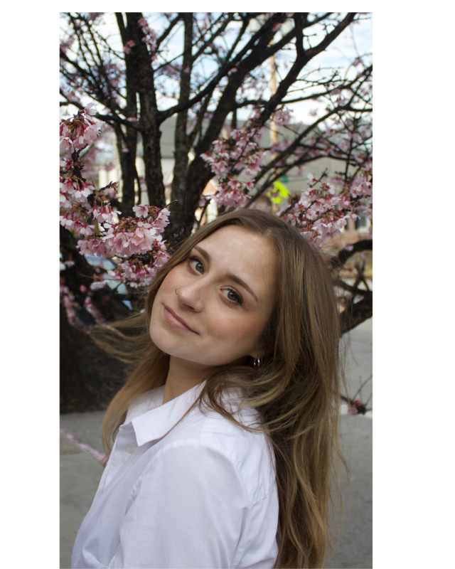 Claire smiling at camera.