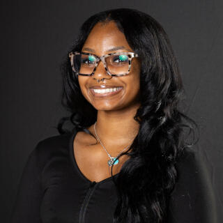 Mar'Kia smiling at the camera.