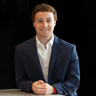 Reece smiling at the camera.