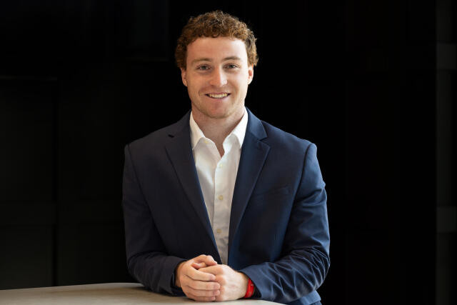 Reece smiling at the camera.