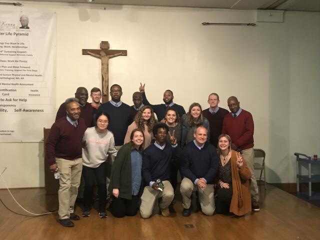 Buck-I-SERV alternative break participants gathered with Father McKenna Center staff