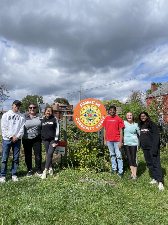 Students on a Local Service Trip to a community garden.