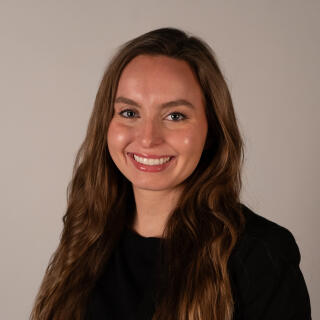 Kora smiling at the camera.