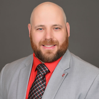 Josh smiling at the camera.