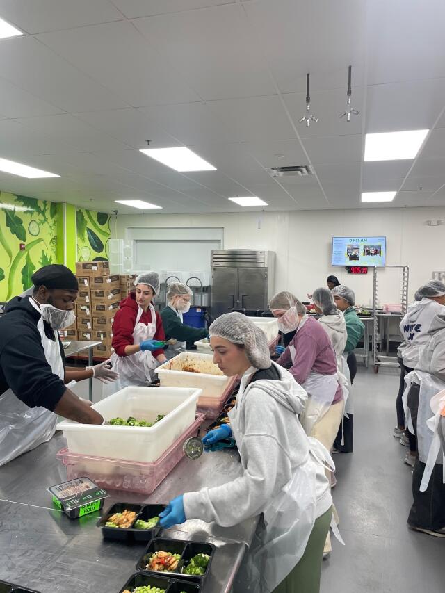 Winter 2025 Medici Project Human Trafficking Group Volunteering at a local food bank in Atlanta