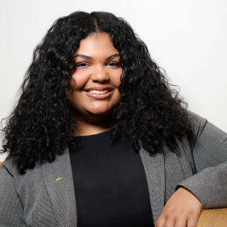 Emma smiling at the camera.