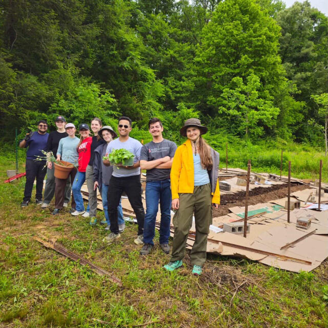 Nine student working on a garden with Once Upon a Time in Tennessee