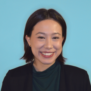 Phoebe smiling at the camera.