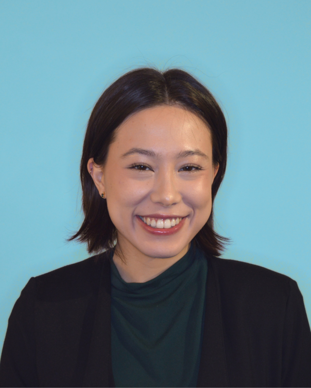 Phoebe smiling at the camera.