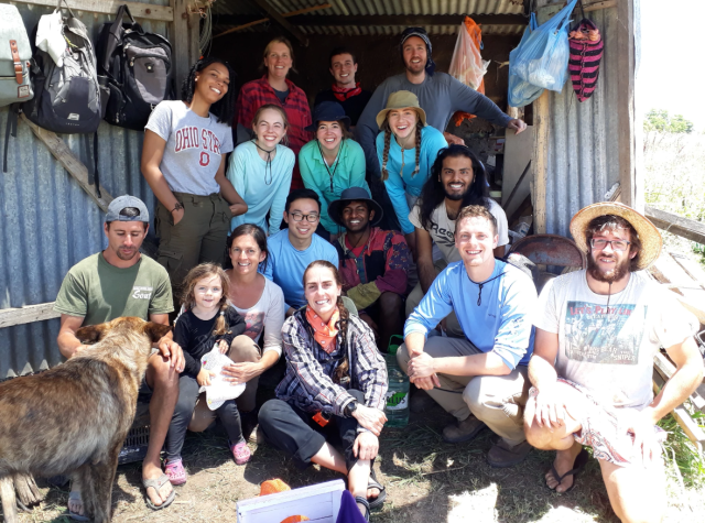 Group of college student volunteers posing with Rizoma Field School staff in Uruguay