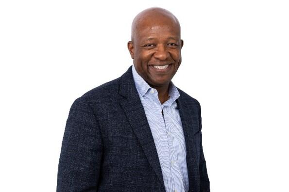 Robert smiling at the camera.