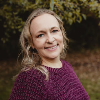 Rachel smiling at the camera.