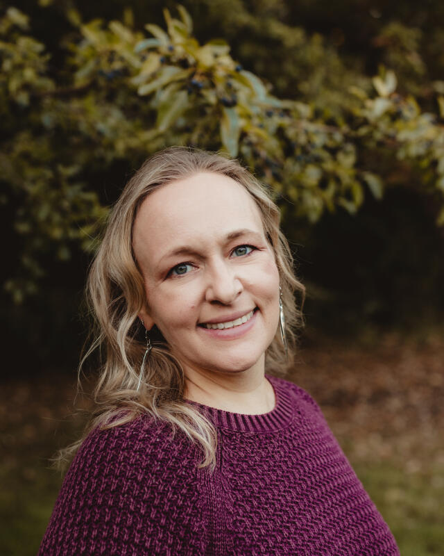 Rachel smiling at the camera.