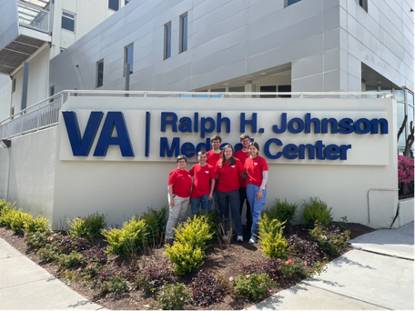 Buck-I-SERV volunteers standing outside of Ralph H. Johnson Veterans Affairs Medical Center